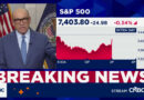 Divided Fed holds interest rates steady, but three members voted to hike