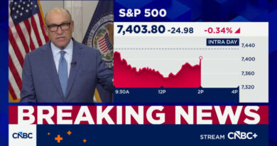 Divided Fed holds interest rates steady, but three members voted to hike