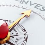 compass-with-canada-flag-pointing-to-the-word-invest.jpg